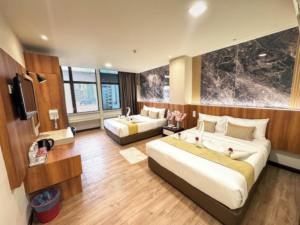 Swiss Hotel Kuala Lumpur Room Type - Premium Family Room with KL Tower View