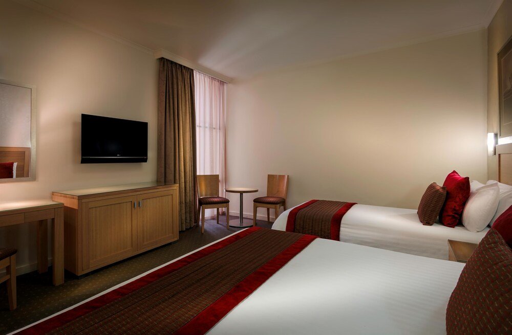 Best Western Plus Travel Inn Hotel - Tap to explore photos