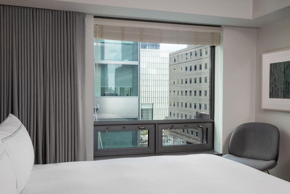 Conrad New York Downtown by Hilton - Tap to explore photos