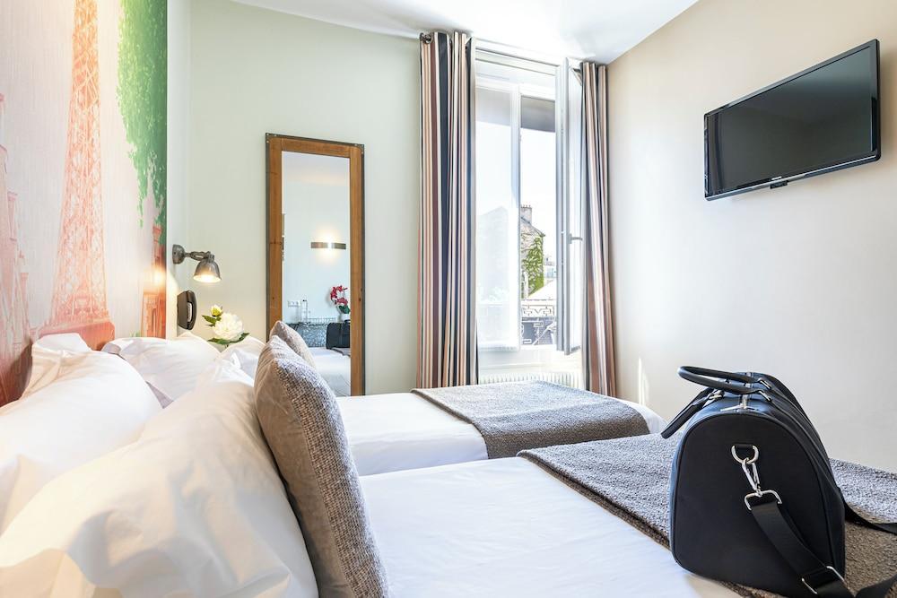 Hôtel Alpha Paris Eiffel by Patrick Hayat Room Type - Two double rooms Eiffel (Adjacent- no communicating) for 4 people Hôtel Alpha Paris Eiffel by Patrick Hayat Room Type - Two double rooms Eiffel (Adjacent- no communicating) for 4 people