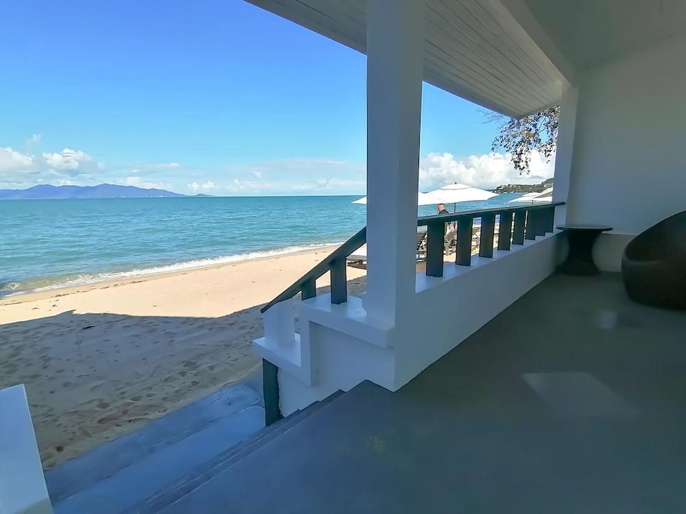 The Cosy Beach Resort - Tap to explore photos